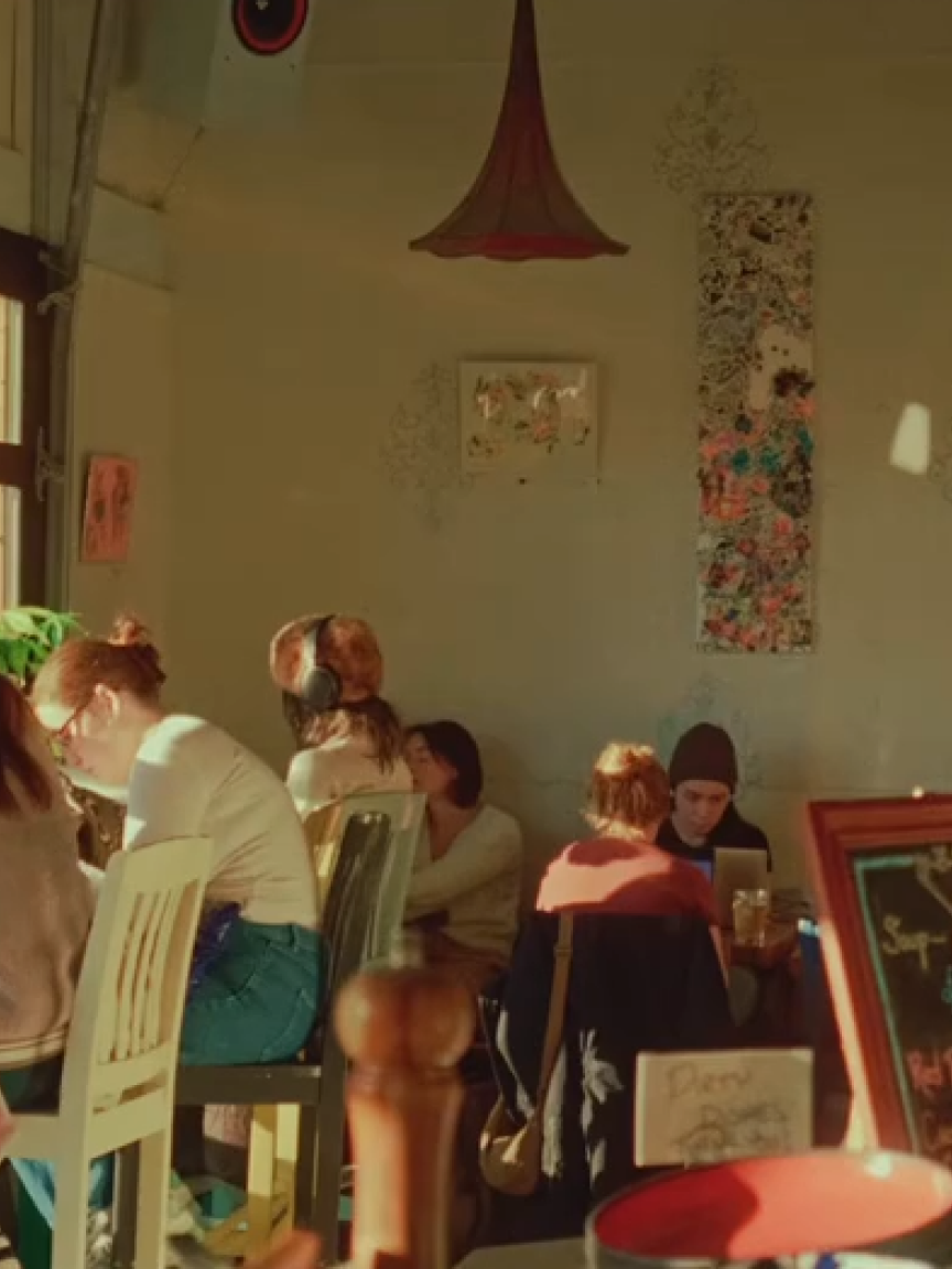 A warm café filled with conversation